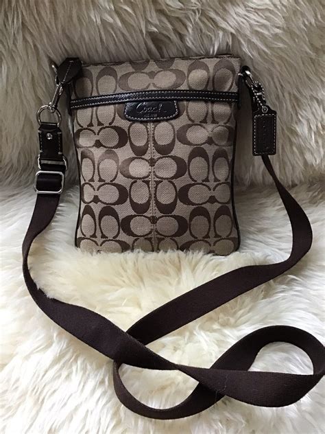 coach adjustable strap handbags.